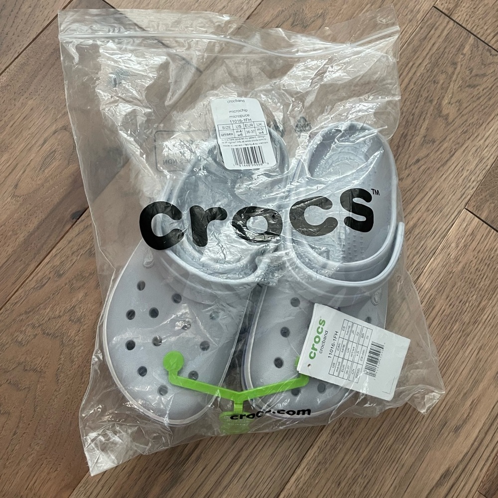 Brand new crocs. W: 6    M: 4